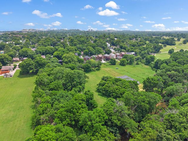 a view of a city and lake