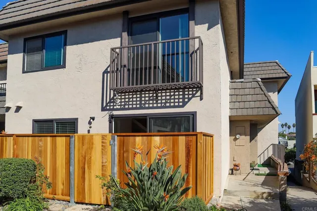 a terrace with a table and chairs