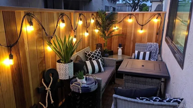 a dining room with furniture and lamp