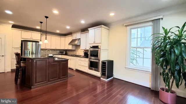a bedroom with furniture and a fireplace
