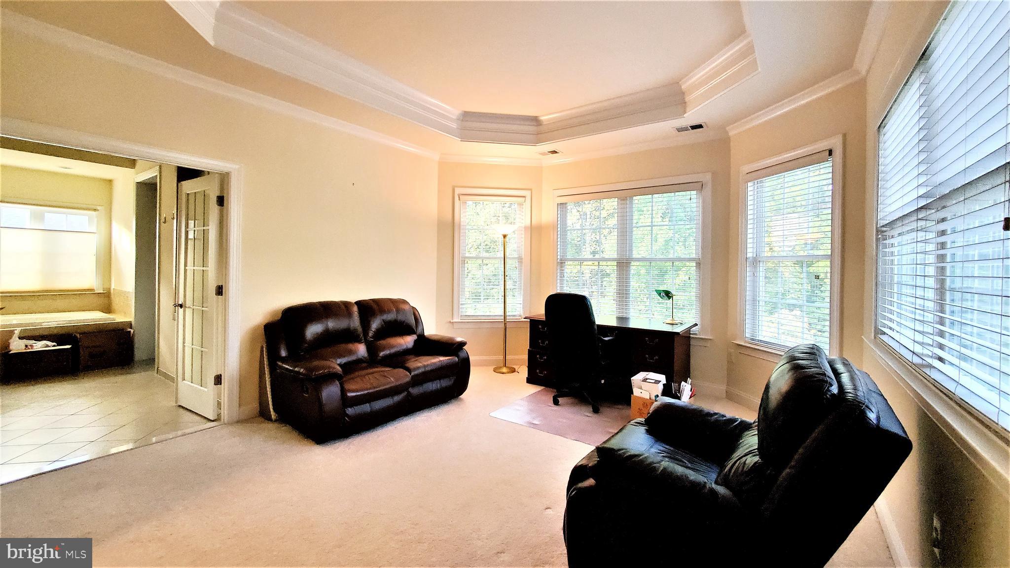 12614 Winter Wren Court Herndon, VA 20171 - Photo 31 of 55 a living room with furniture window and a couch