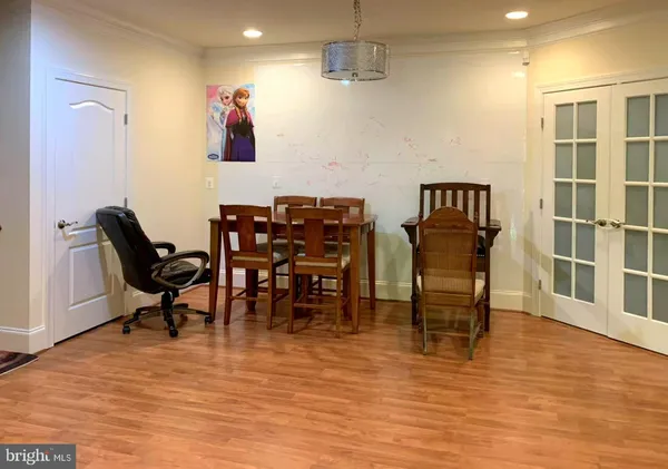 view of living room with furniture and floor to ceiling window