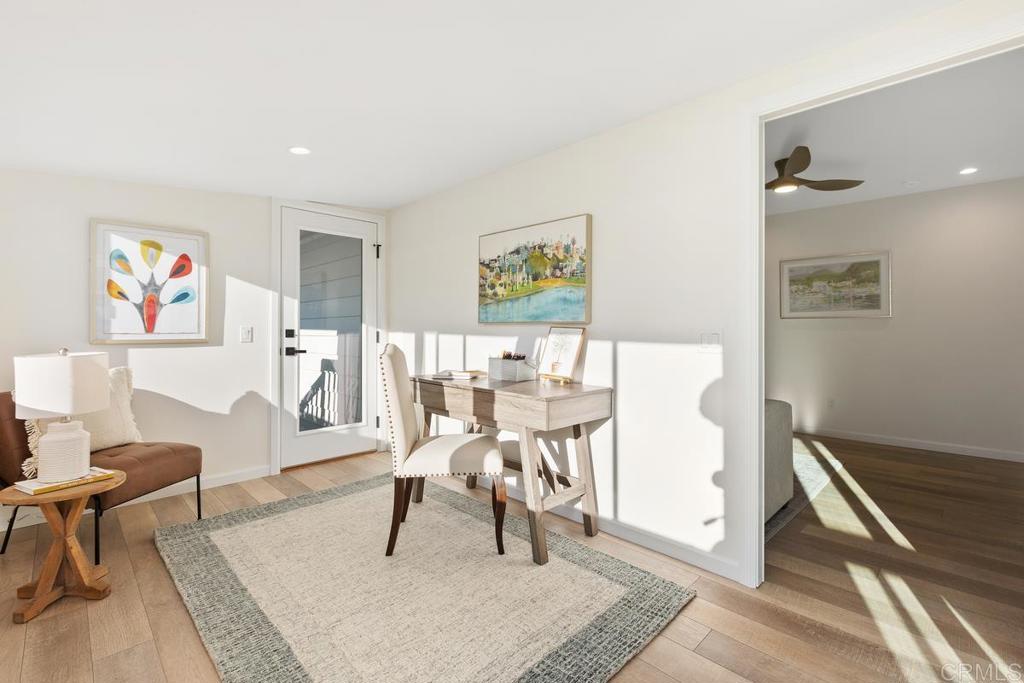 7144 Santa Rosa Carlsbad, CA 92011 - Photo 19 of 41 a living room with furniture and a rug