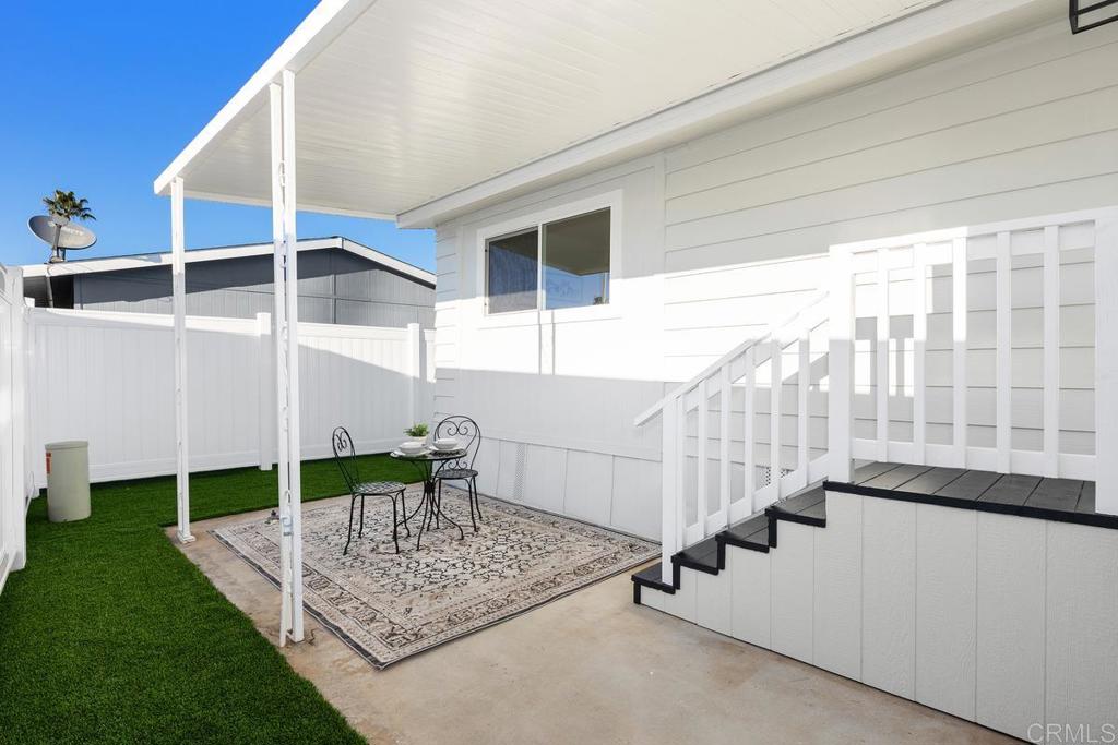 7144 Santa Rosa Carlsbad, CA 92011 - Photo 36 of 41 a view of staircase with white walls and windows