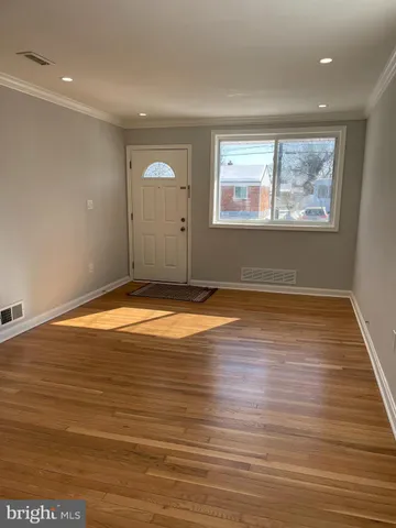 a kitchen with stainless steel appliances granite countertop a stove sink and cabinets