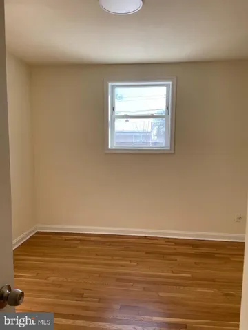 a bathroom with a sink a mirror and a shower