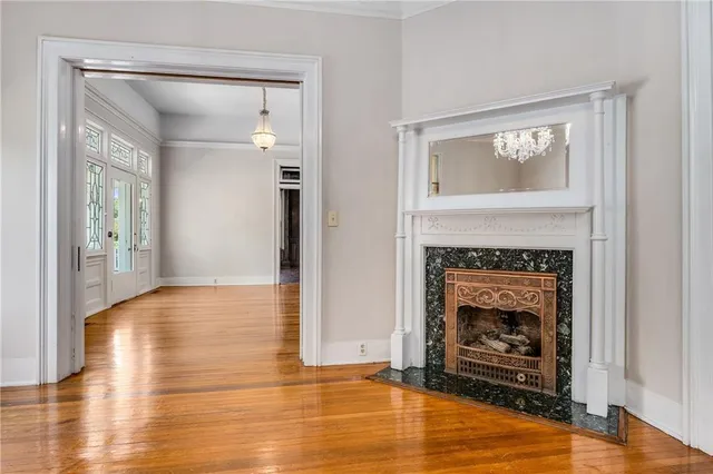 a kitchen with stainless steel appliances kitchen island granite countertop a sink and a stove