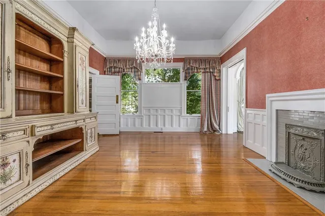 a kitchen with stainless steel appliances a stove microwave and cabinets