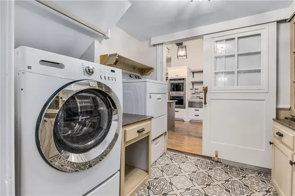 a bathroom with a toilet and a sink