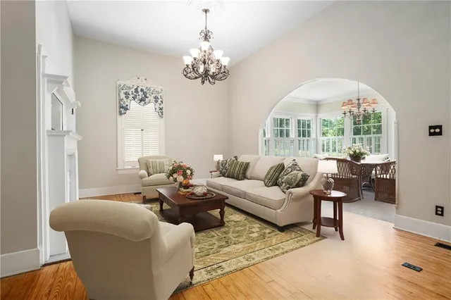 a bedroom with a bed and a fireplace