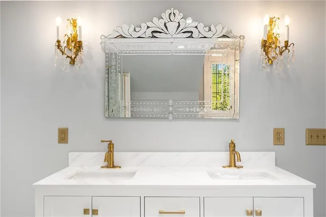 a view of a deck with a bench and wooden floor