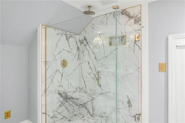 a view of a deck with a table and chairs and wooden floor