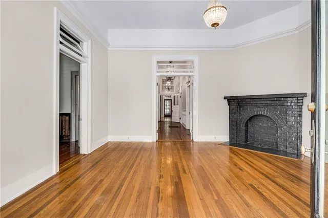 a view of livingroom with furniture wooden floor window and fire place