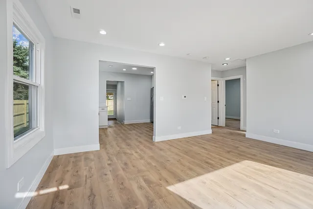 a view of an empty room and window