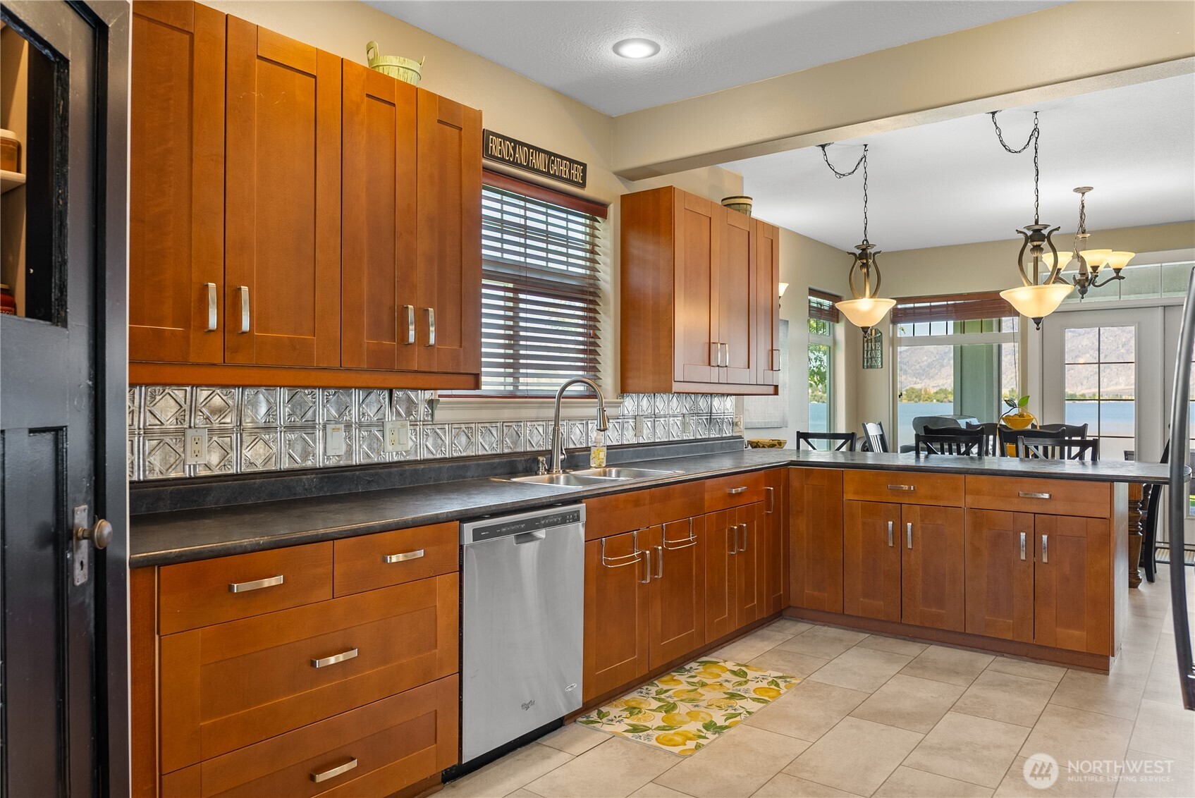 72 Boundary Point Road Oroville, WA 98844 - Photo 14 of 40 a bathroom with a sink a vanity and mirror