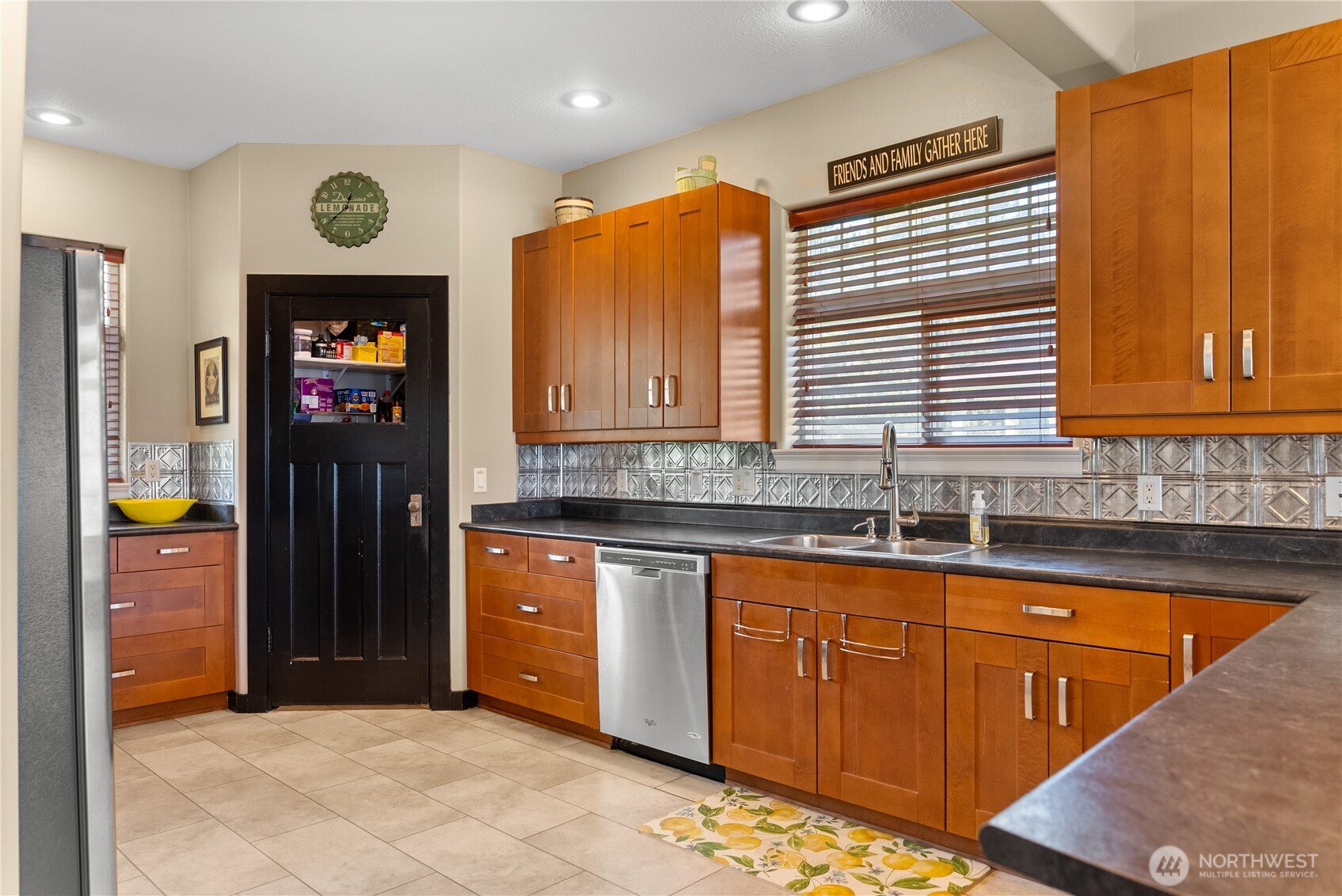 72 Boundary Point Road Oroville, WA 98844 - Photo 15 of 40 a kitchen with stainless steel appliances granite countertop a refrigerator and a sink