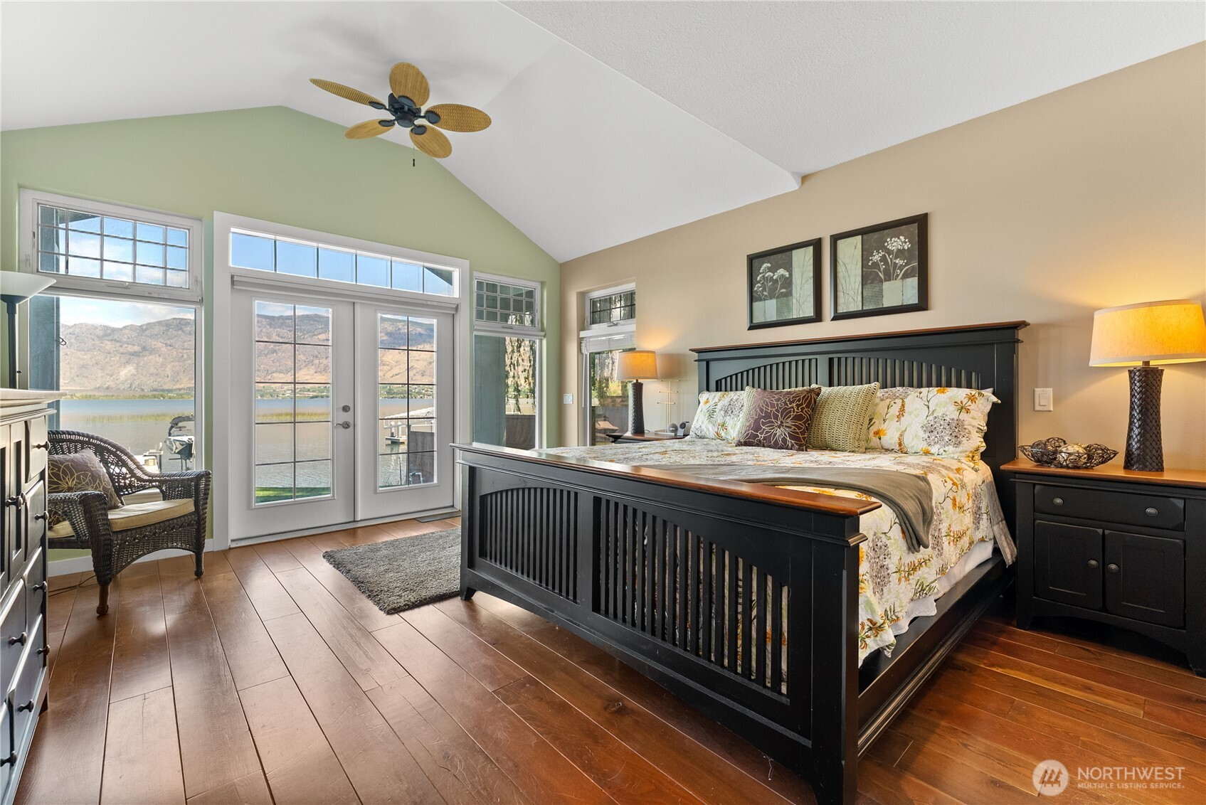 72 Boundary Point Road Oroville, WA 98844 - Photo 17 of 40 a bedroom with a bed and a large window