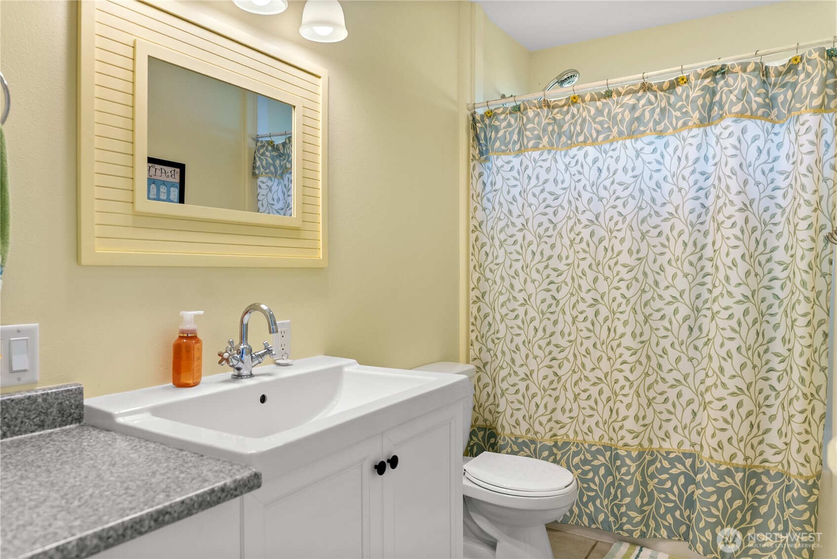 72 Boundary Point Road Oroville, WA 98844 - Photo 23 of 40 a bathroom with a sink toilet and mirror