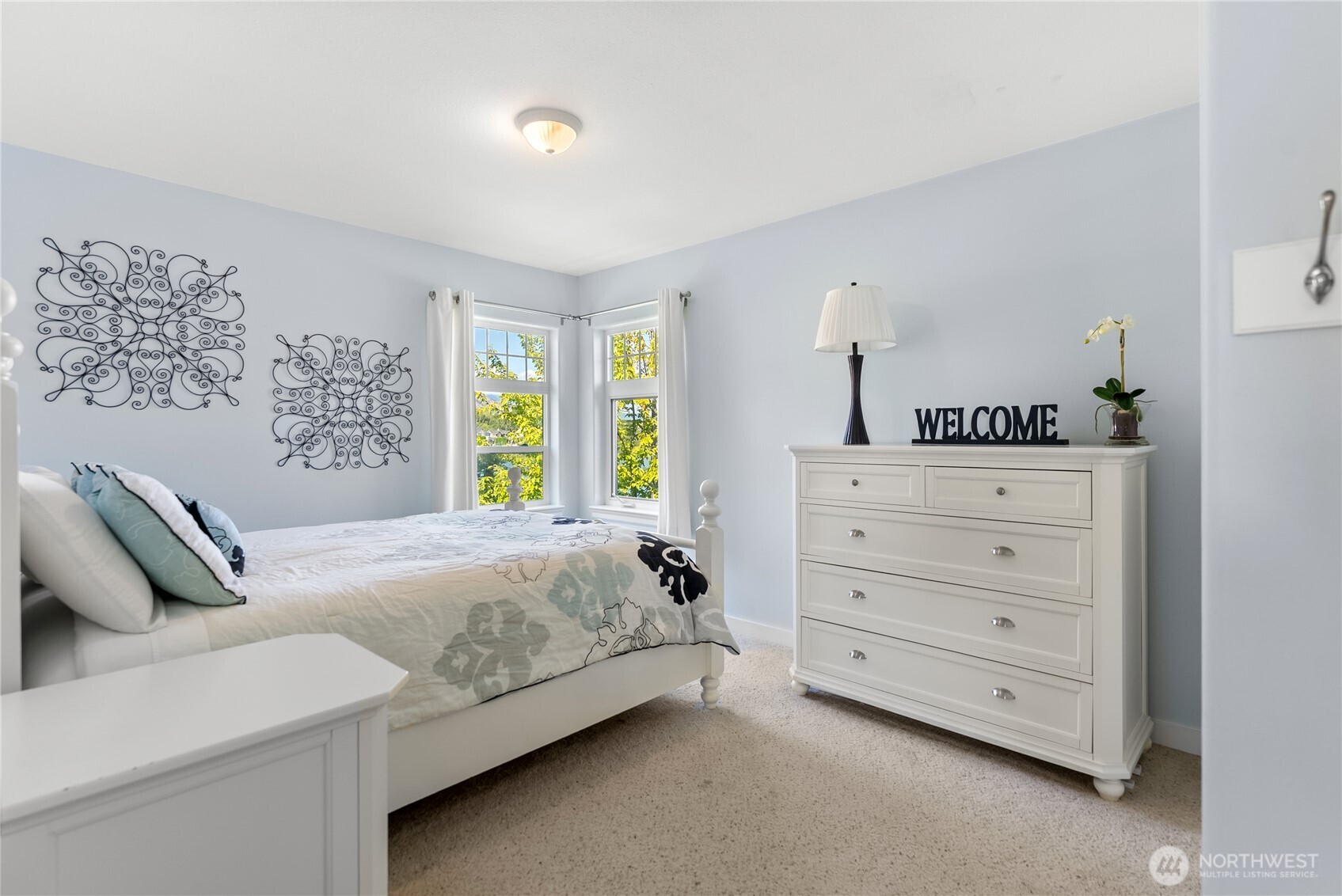 72 Boundary Point Road Oroville, WA 98844 - Photo 24 of 40 a bedroom with a bed and a dresser