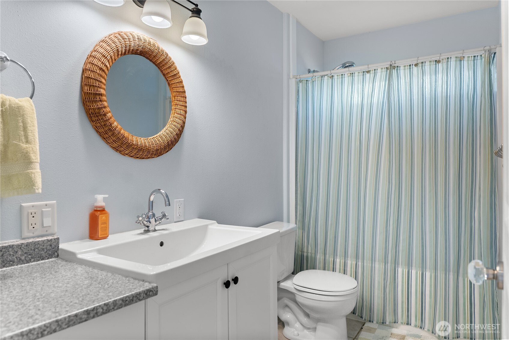 72 Boundary Point Road Oroville, WA 98844 - Photo 25 of 40 a bathroom with a sink and a mirror