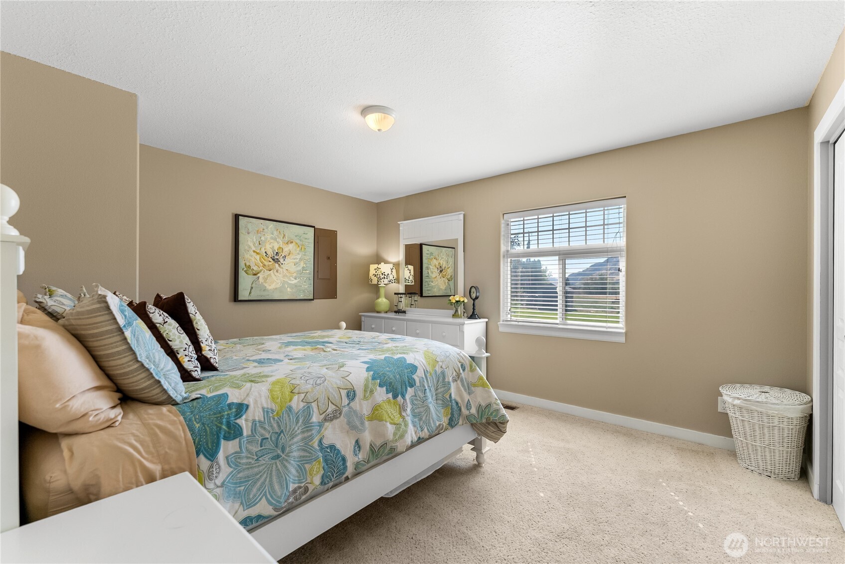 72 Boundary Point Road Oroville, WA 98844 - Photo 28 of 40 a bedroom with bed and window