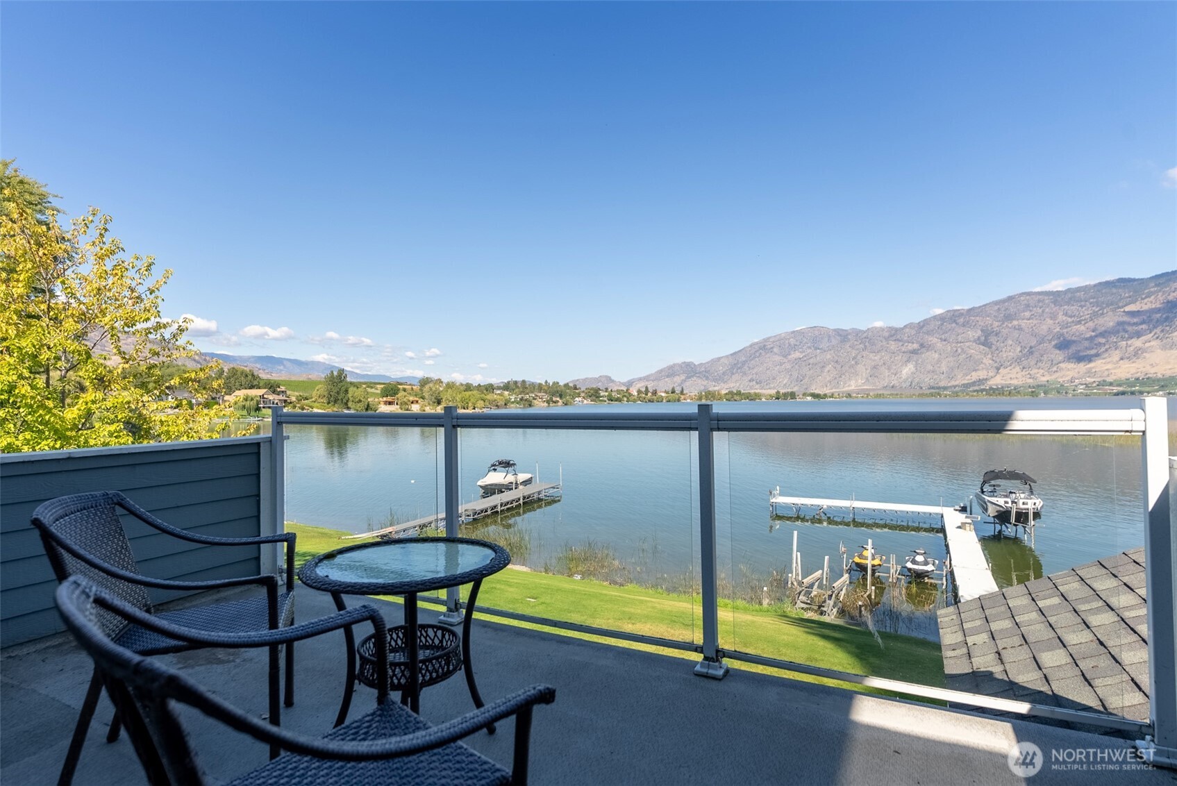 72 Boundary Point Road Oroville, WA 98844 - Photo 30 of 40 a view of a chairs and table in the terrace