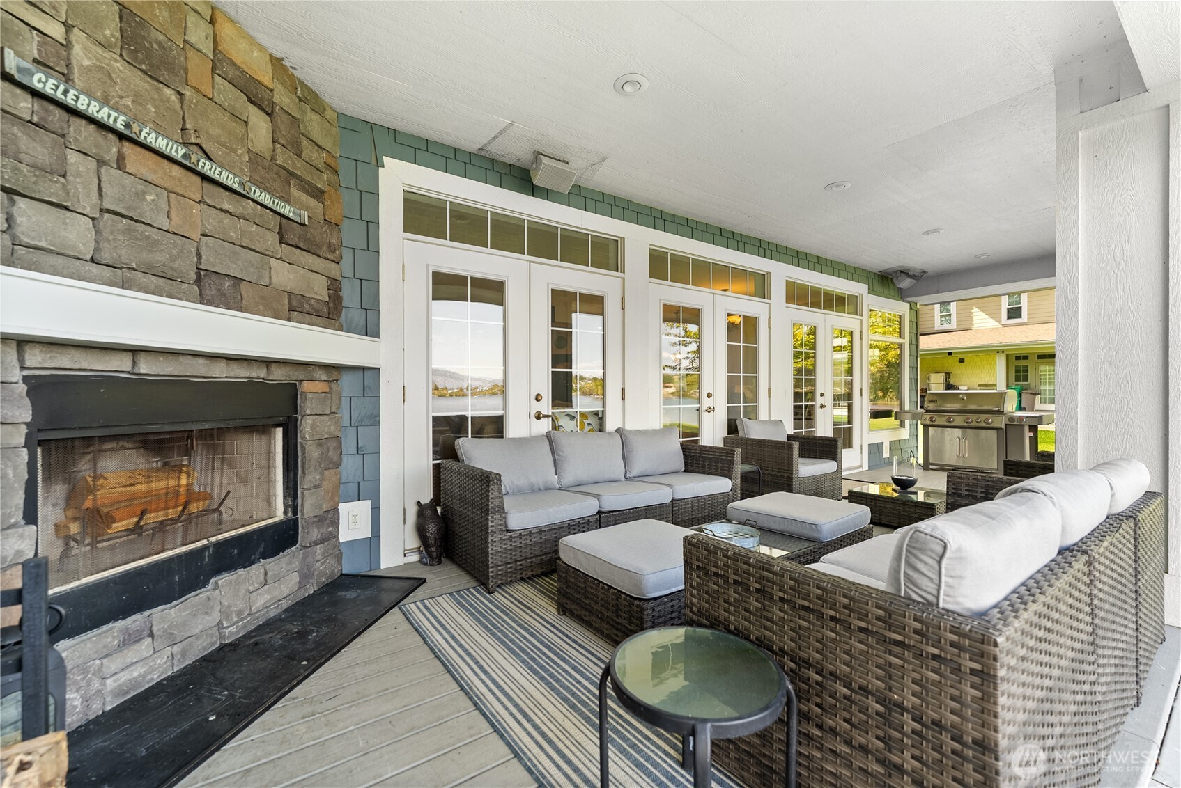 72 Boundary Point Road Oroville, WA 98844 - Photo 34 of 40 a living room with furniture and a fireplace