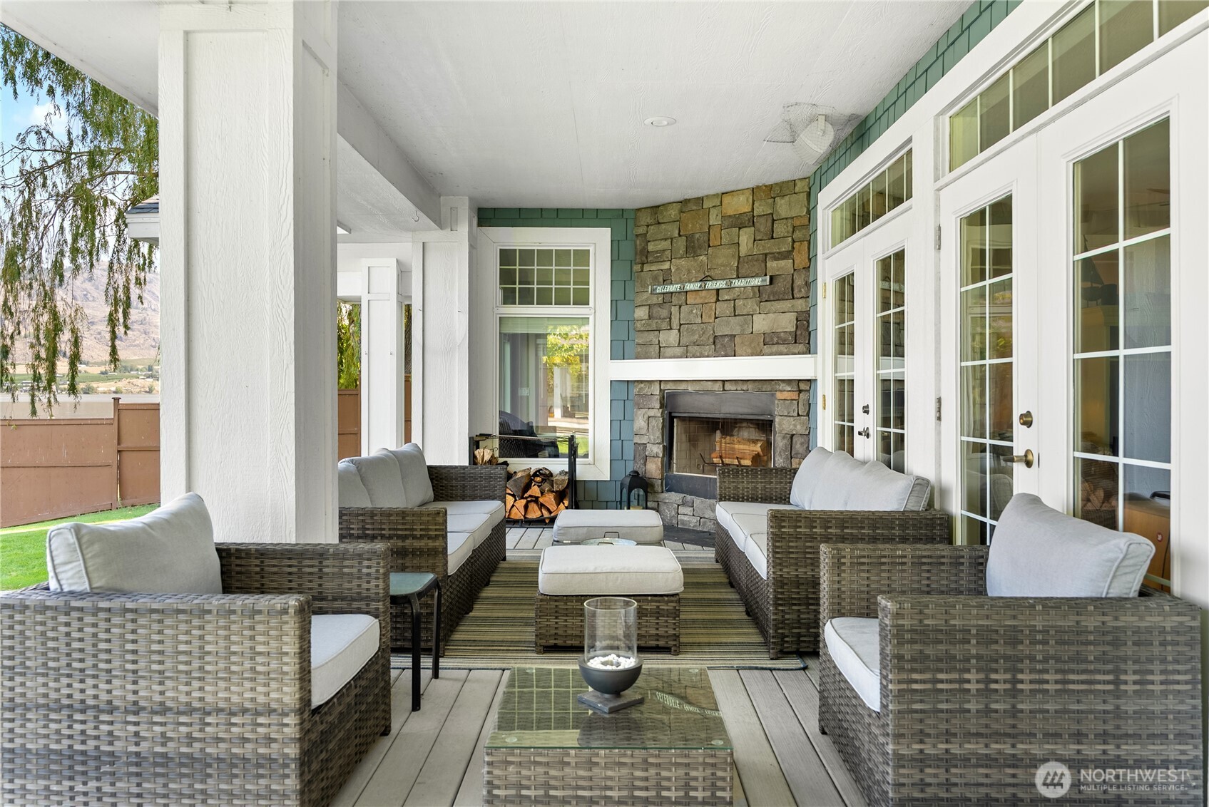 72 Boundary Point Road Oroville, WA 98844 - Photo 35 of 40 a living room with furniture and a fireplace