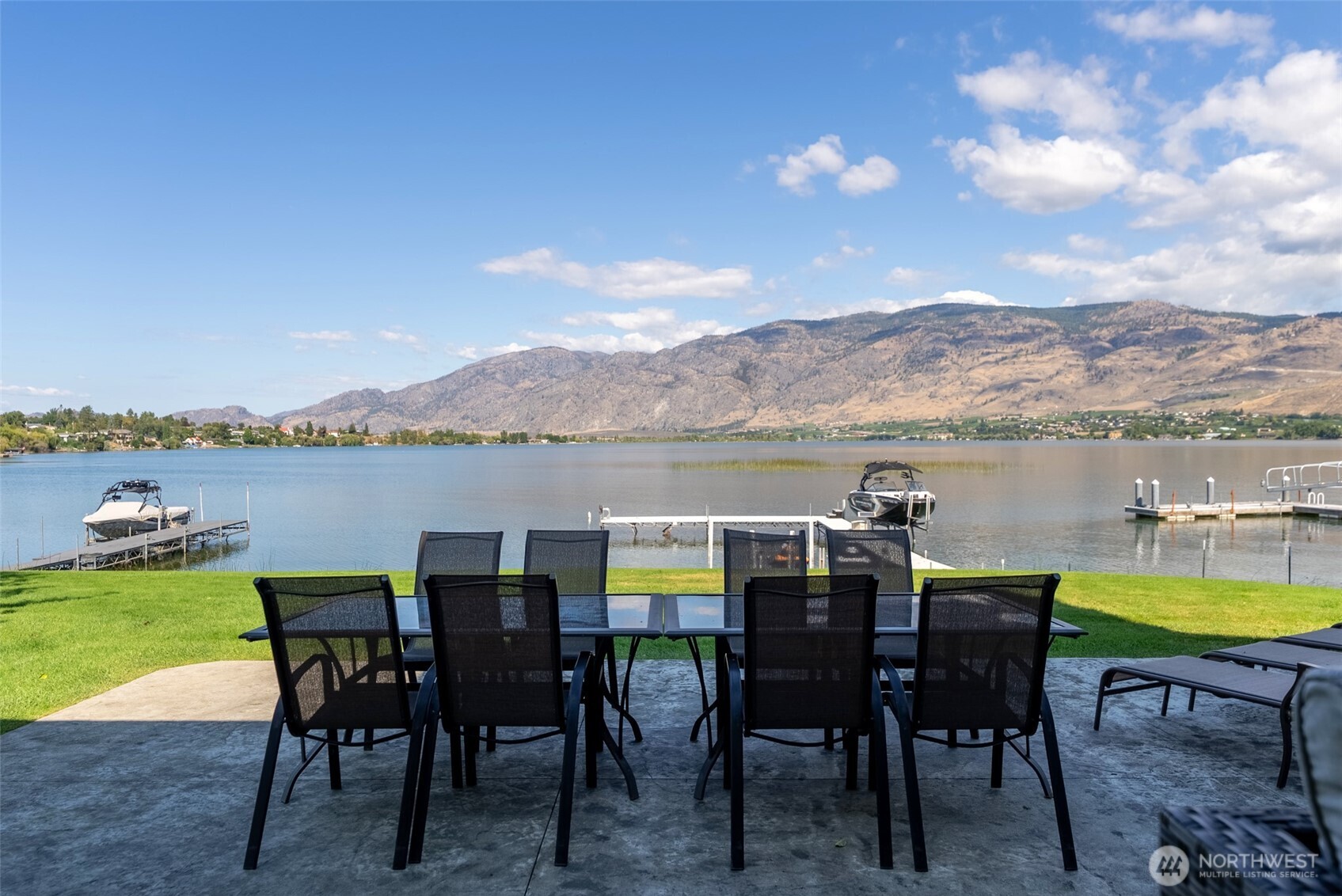 72 Boundary Point Road Oroville, WA 98844 - Photo 5 of 40 a view of a chairs and table in patio