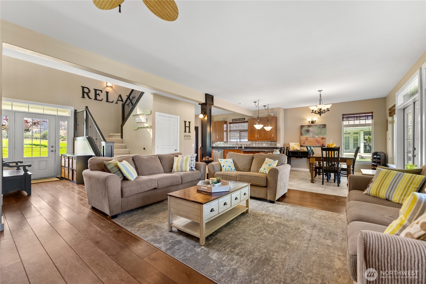 72 Boundary Point Road Oroville, WA 98844 - Photo 8 of 40 a living room with furniture kitchen view and a wooden floor