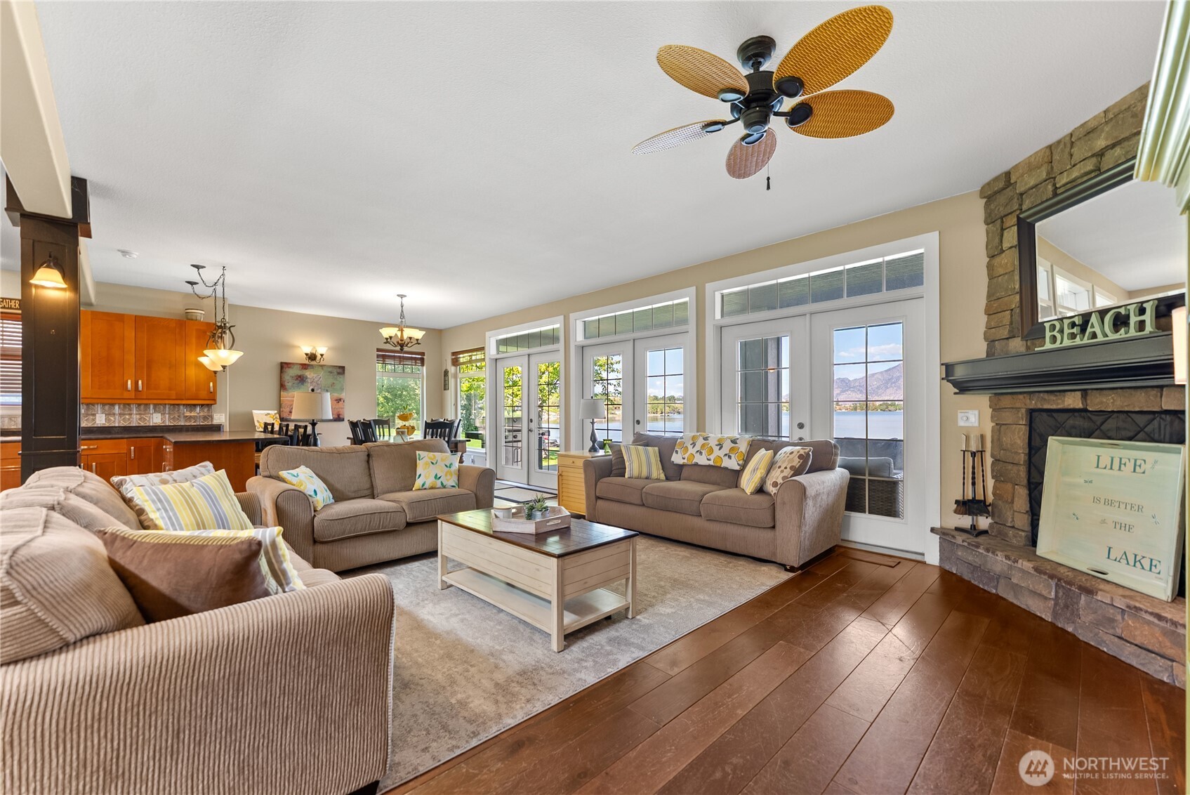 72 Boundary Point Road Oroville, WA 98844 - Photo 9 of 40 a living room with furniture and a fireplace