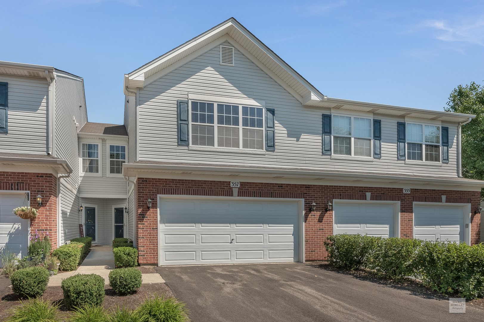 357 Grape Vine Trail Oswego, IL 60543 - Photo 1 of 27 a front view of a house with a yard