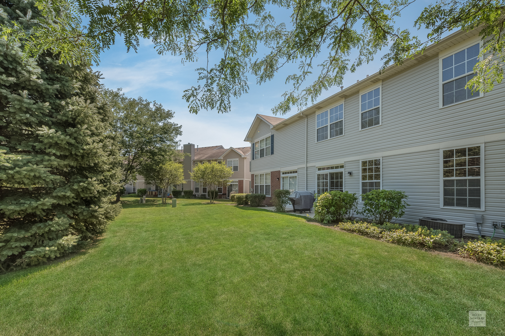 357 Grape Vine Trail Oswego, IL 60543 - Photo 24 of 27 a view of a house with a garden