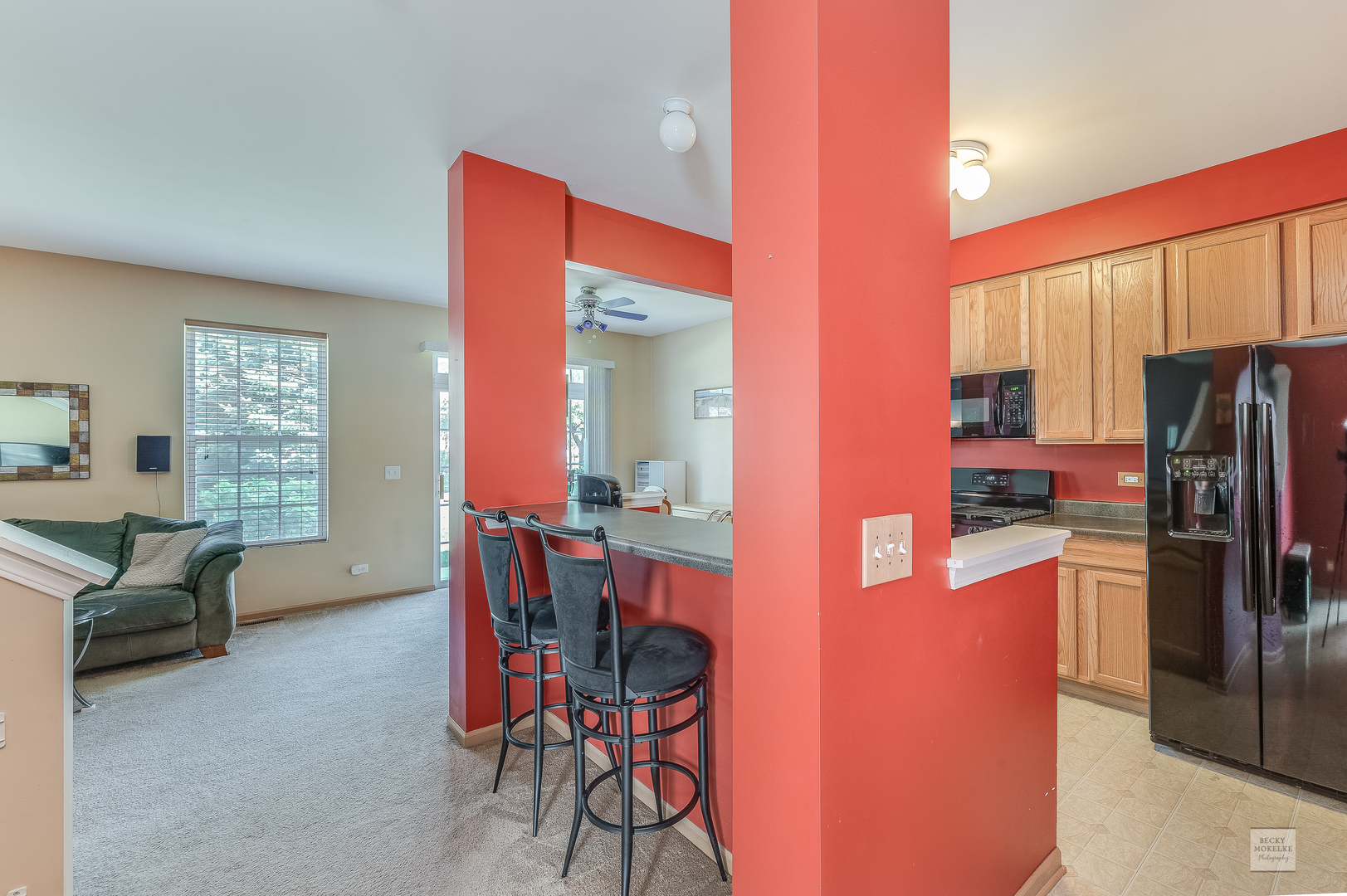 357 Grape Vine Trail Oswego, IL 60543 - Photo 4 of 27 a kitchen with stainless steel appliances a refrigerator a table and chairs