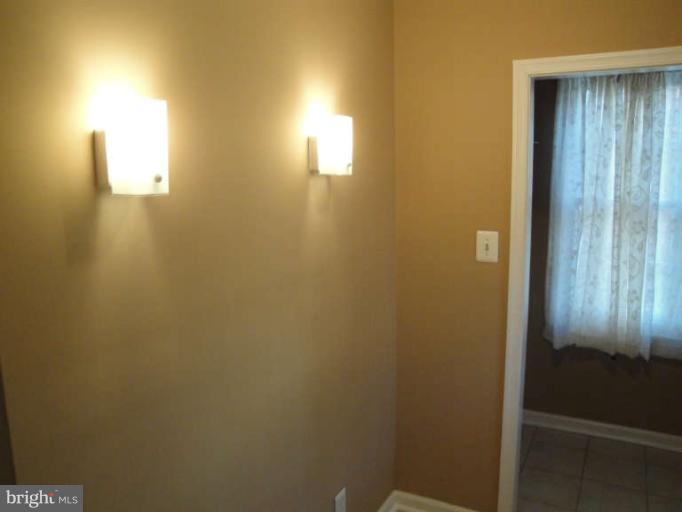 800 Olmstead Road Baltimore, MD 21208 - Photo 23 of 23 Tiled Entrance Foyer With Large Coat Room
