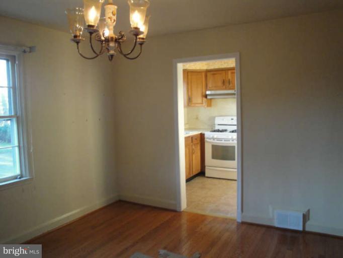800 Olmstead Road Baltimore, MD 21208 - Photo 6 of 23 Dining Room With View Into Kitchen