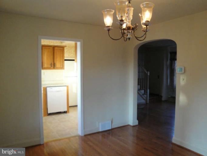 800 Olmstead Road Baltimore, MD 21208 - Photo 7 of 23 Dining Room With View Into Living Room