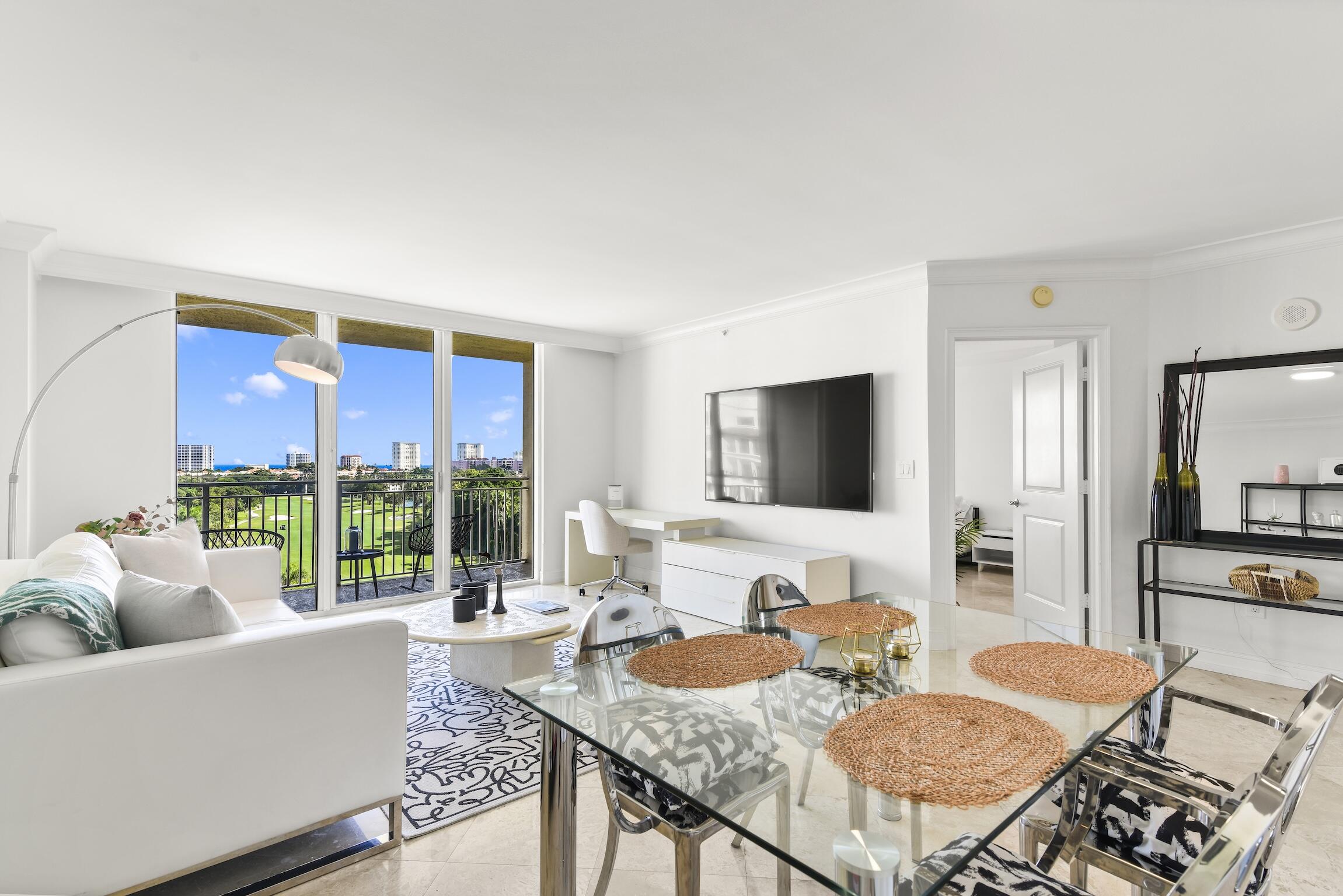 99 Southeast Mizner Boulevard, Unit 813 Boca Raton, FL 33432 - Photo 8 of 43 Living / Dining Room