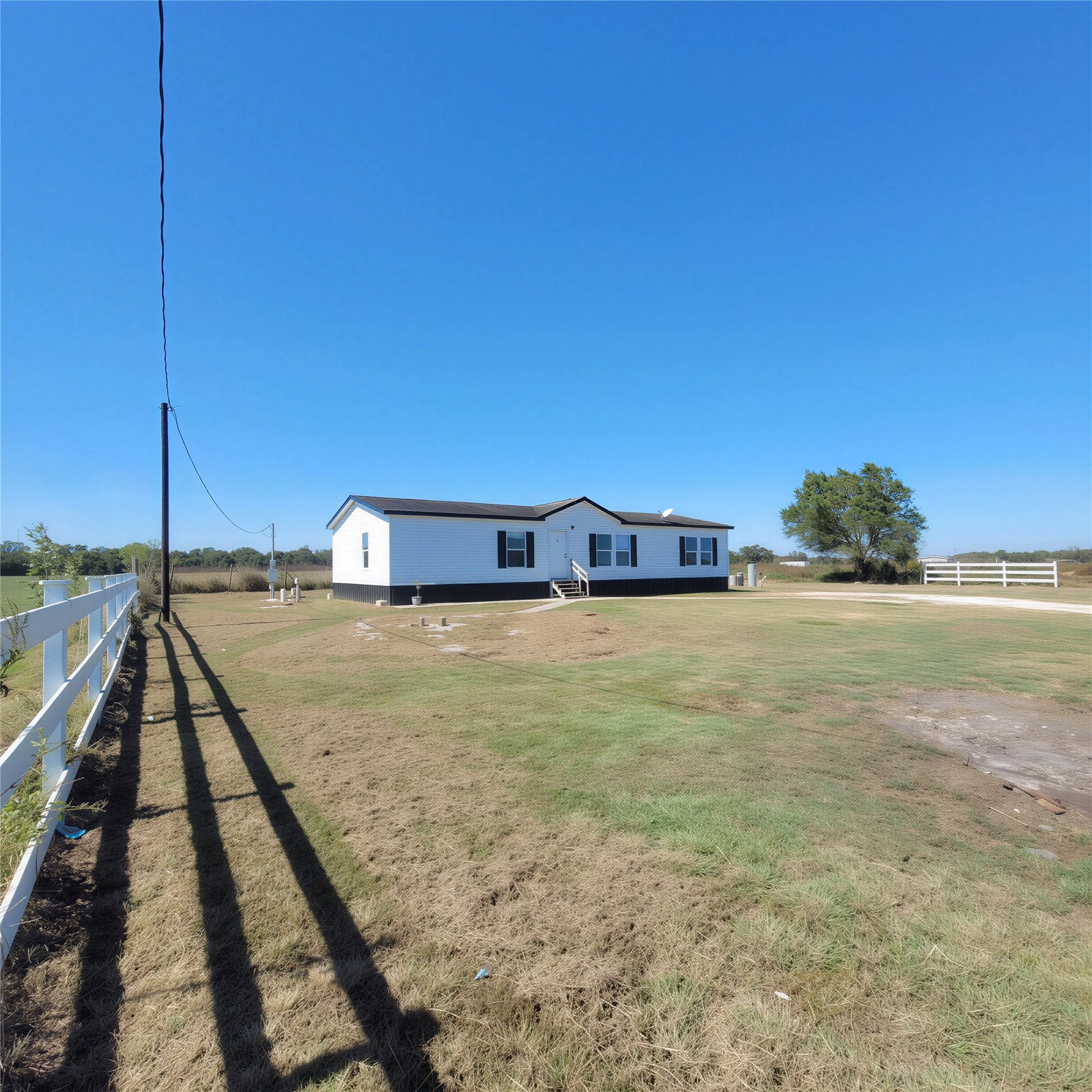 740 County Road 164 Boling, TX 77420 - Photo 12 of 16 a house view with a outdoor space