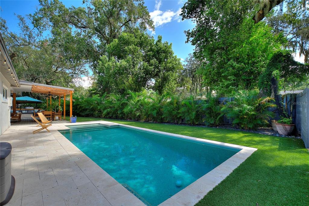 640 Arjay Way Winter Park, FL 32789 - Photo 29 of 46 a view of a swimming pool and lounge chairs
