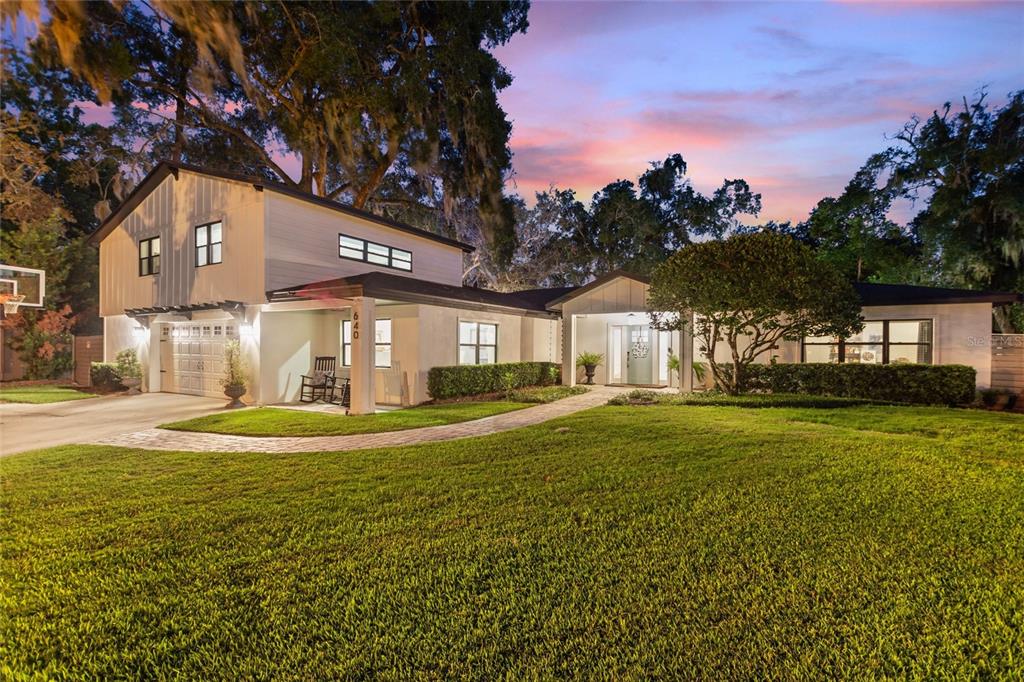 640 Arjay Way Winter Park, FL 32789 - Photo 7 of 46 a view of a house with a yard