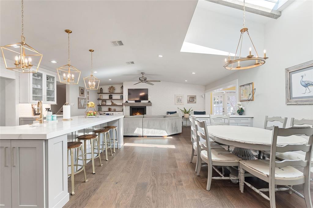 640 Arjay Way Winter Park, FL 32789 - Photo 9 of 46 a large kitchen with a table and chairs