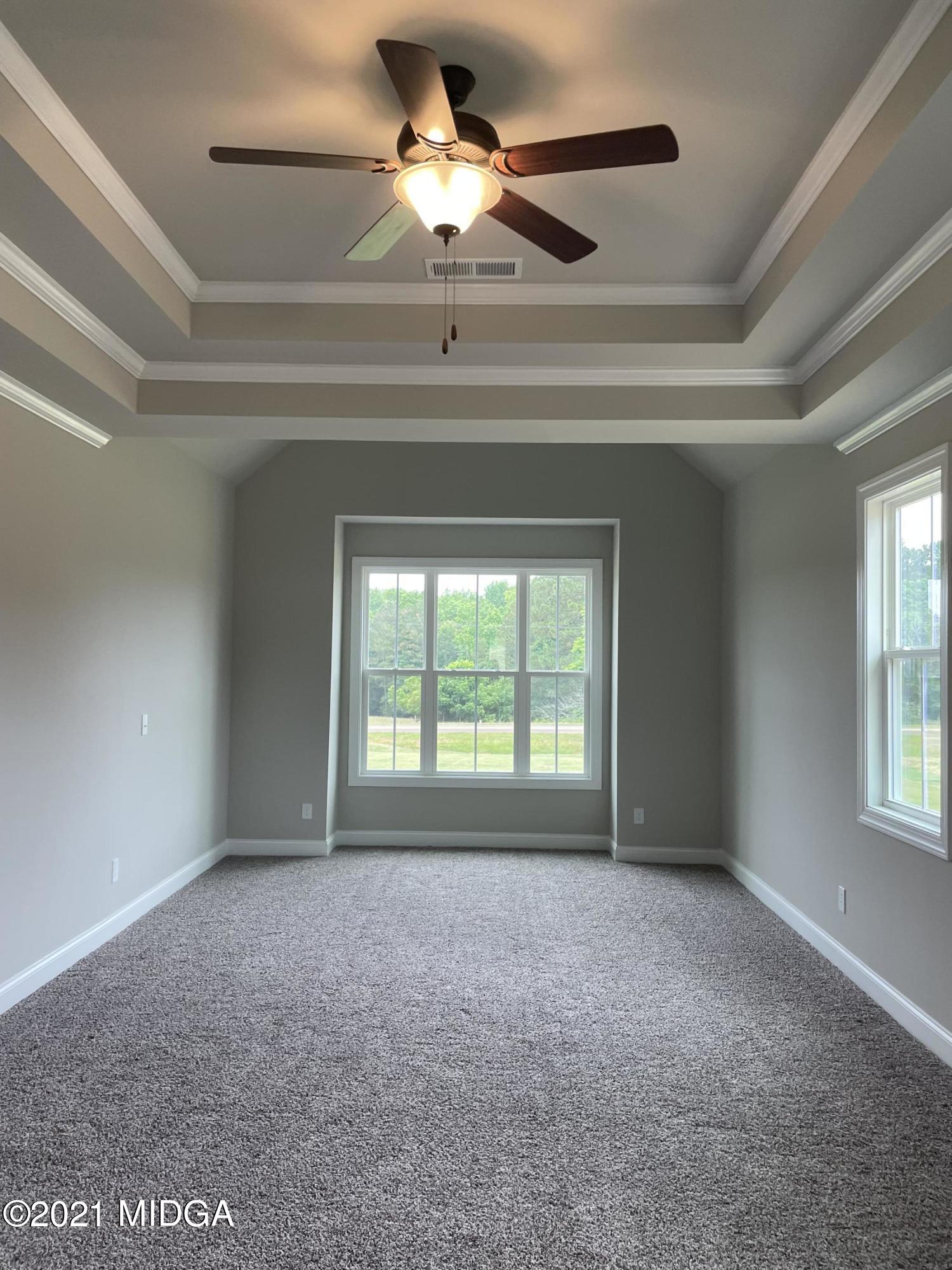 1256 Bunn Road Forsyth, GA 31029 - Photo 9 of 12 a view of an empty room and window