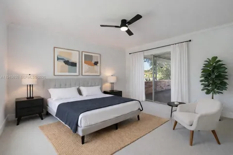 a kitchen with granite countertop a sink and a stove