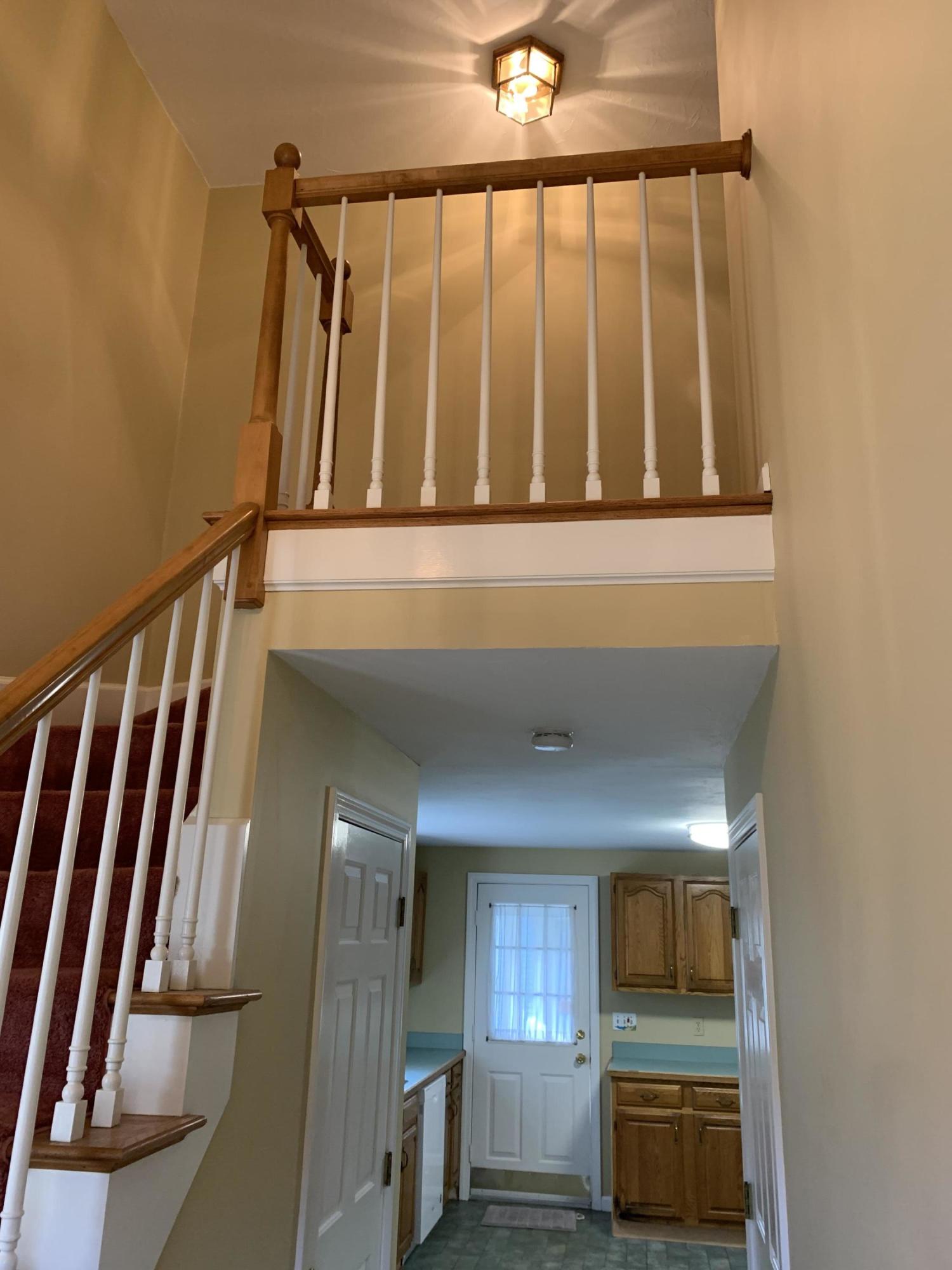 9 Hyde Park Centerville, MA 02632 - Photo 12 of 27 a view of entryway with stairs
