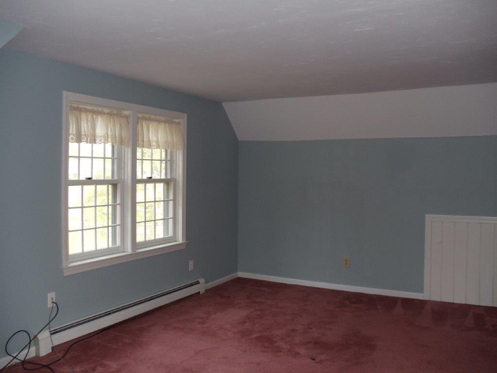 9 Hyde Park Centerville, MA 02632 - Photo 17 of 27 an empty room with a window
