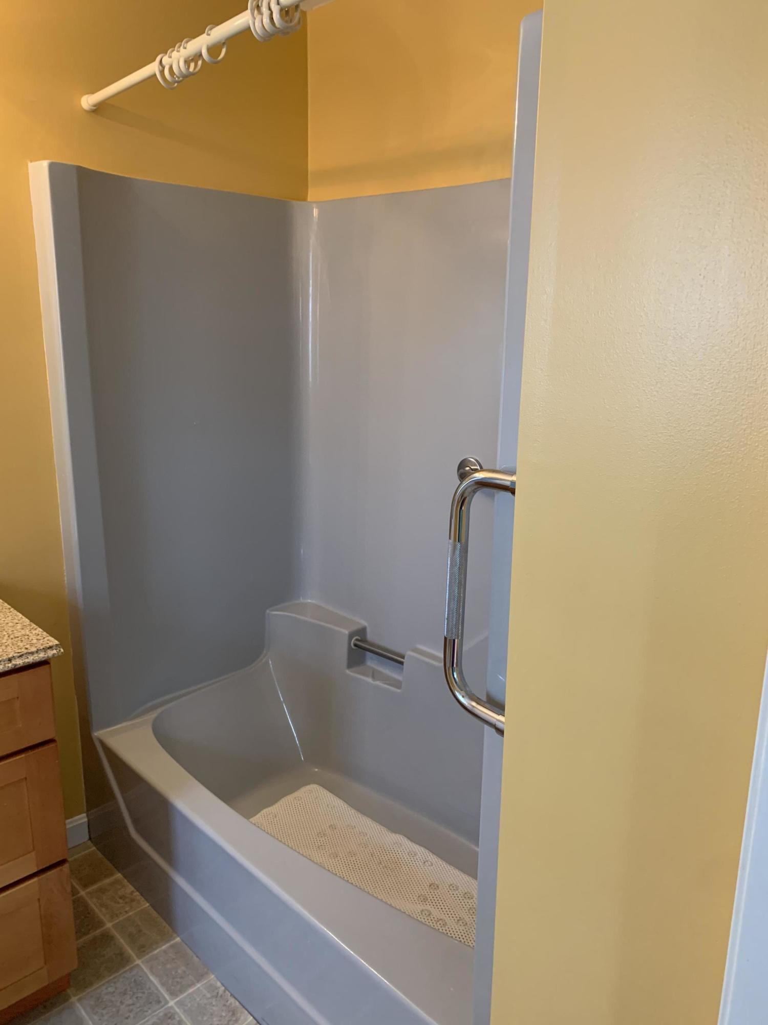 9 Hyde Park Centerville, MA 02632 - Photo 18 of 27 a bathroom with a tub