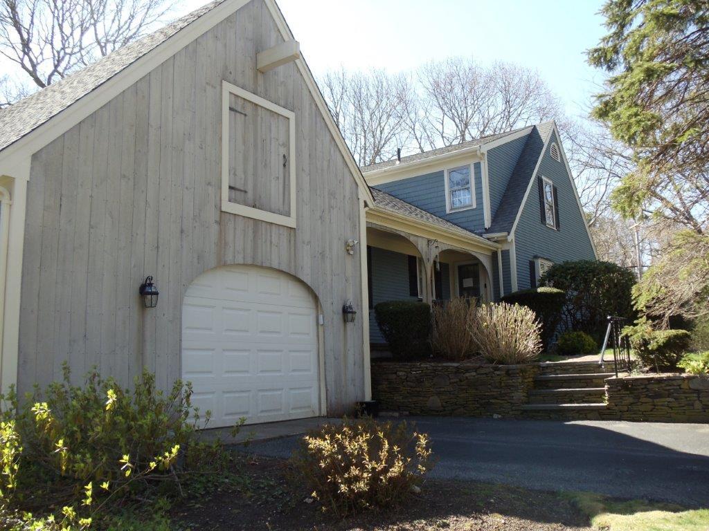 9 Hyde Park Centerville, MA 02632 - Photo 24 of 27 a front view of a house with garden