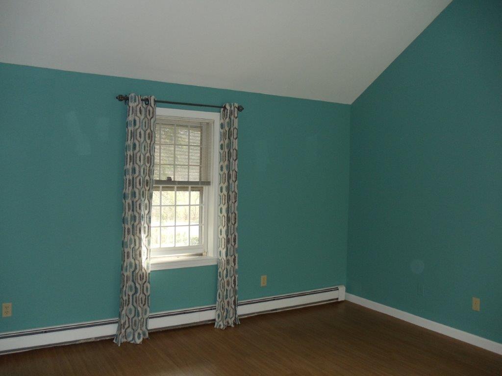 9 Hyde Park Centerville, MA 02632 - Photo 6 of 27 an empty room with a window