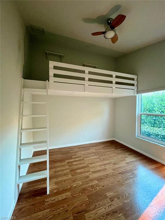 10298 Boca Circle Naples, FL 34109 - Photo 11 of 20 a view of an empty room with a window